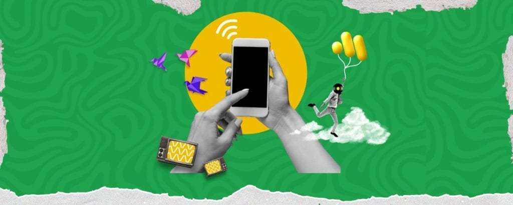 Hands holding smartphone with wireless signals, creative icons, and digital marketing elements on green background