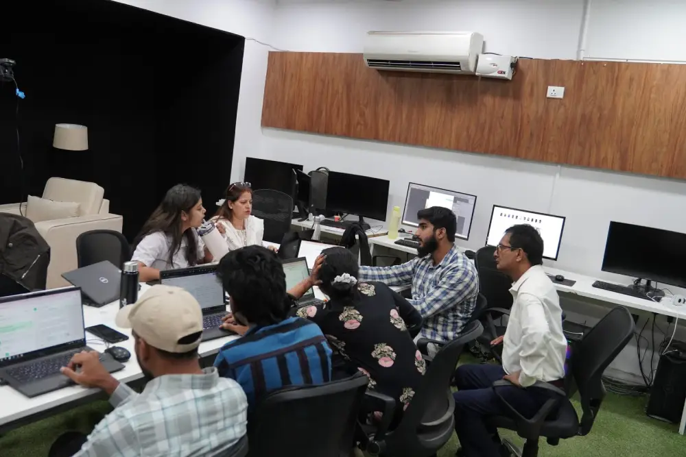 Digital Mojo team collaborating in Hyderabad office during creative brainstorming session