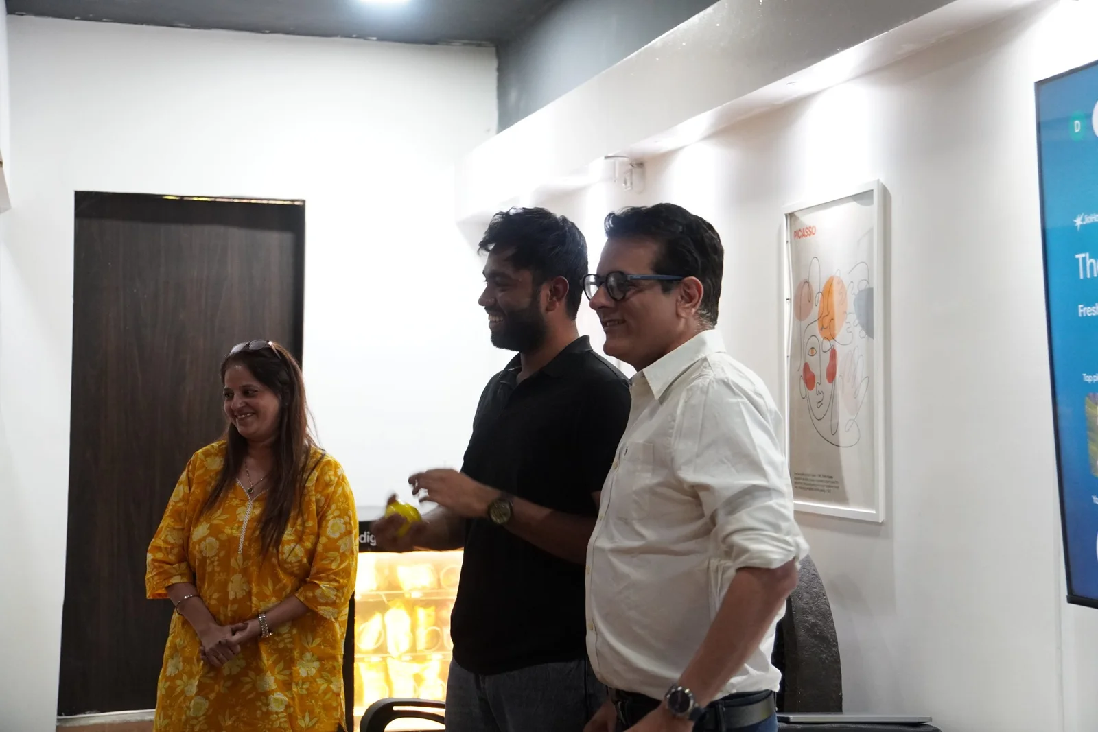 Digital Mojo team members collaborating in modern office space in Hyderabad, India
