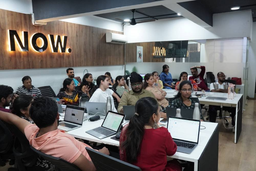 Digital marketing training session at Digital Mojo Hyderabad with participants using laptops in a modern classroom